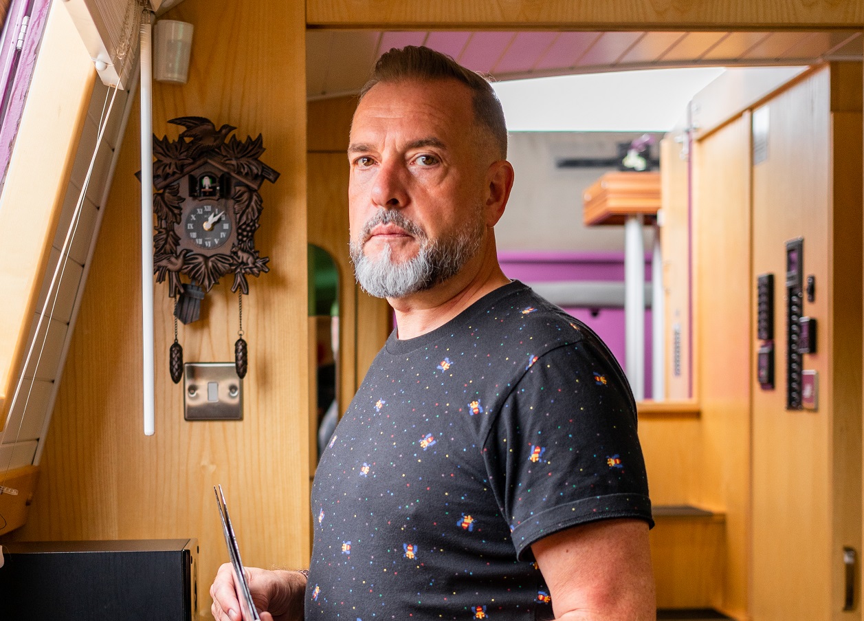 Man in canal boat